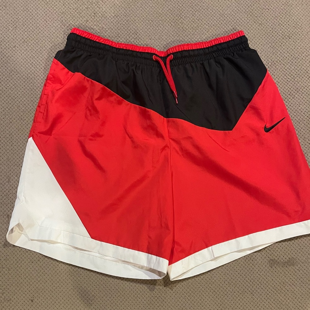 Nike Red and Black Athletic Shorts with Dynamic Color Blocking
